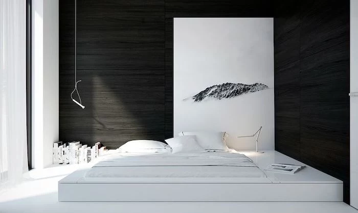 master bedrooms, black walls, white bed frame, abstract art, in black and white