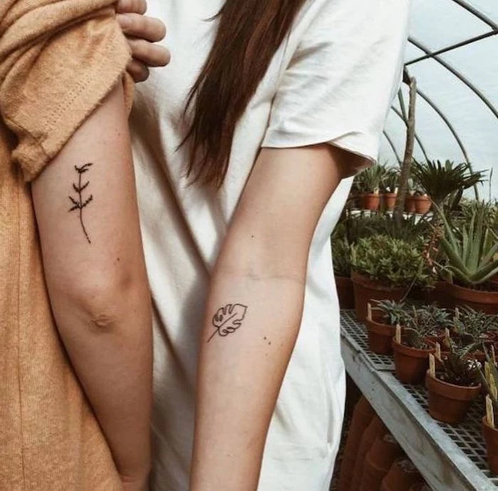 nature inspired, unique couple tattoos, potted plants, white shirt, brown blouse