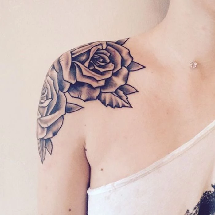 flower shoulder tattoo, white top, girl chest tattoos, white background