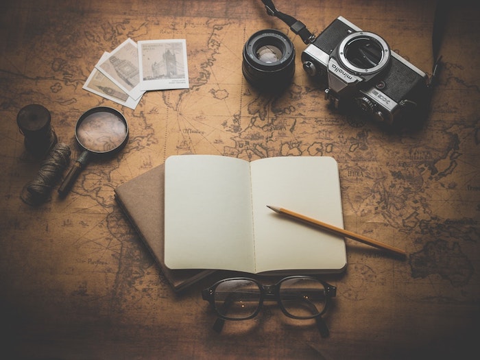 black background tumblr, white notebook, vintage map, vintage photo camera, magnifying glass