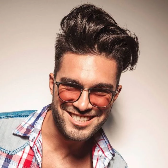 man smiling, wearing sunglasses, black hair, plaid shirt, cool haircuts for boys