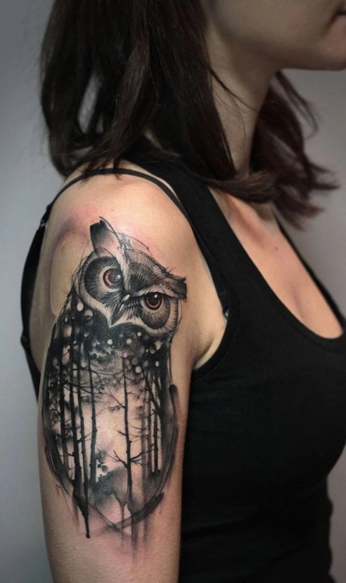 owl and forest, shoulder tattoo, tattoo ideas for women, woman with black hair, wearing black top