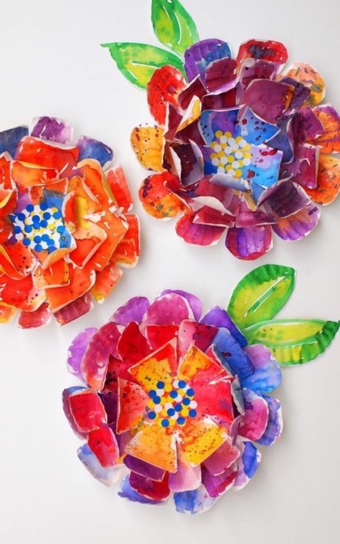 colourful flowers, made out of paper, preschool activities, with green leaves, on white backround