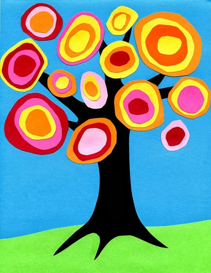 paper tree, blue and green background, kindergarten classroom games, colourful flowers