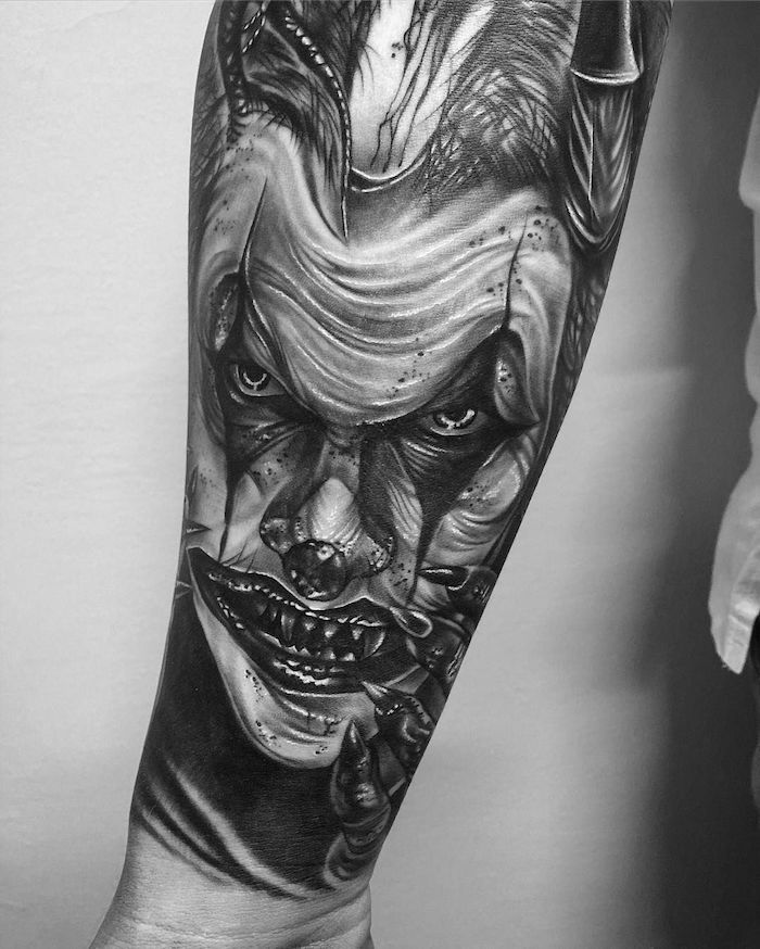 pennywise the dancing clown, forearm tattoo, tattoo ideas for guys, white background