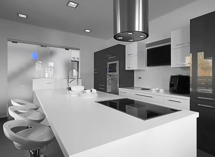 white bar stools, grey and white cabinets, kitchen island decor, white countertops