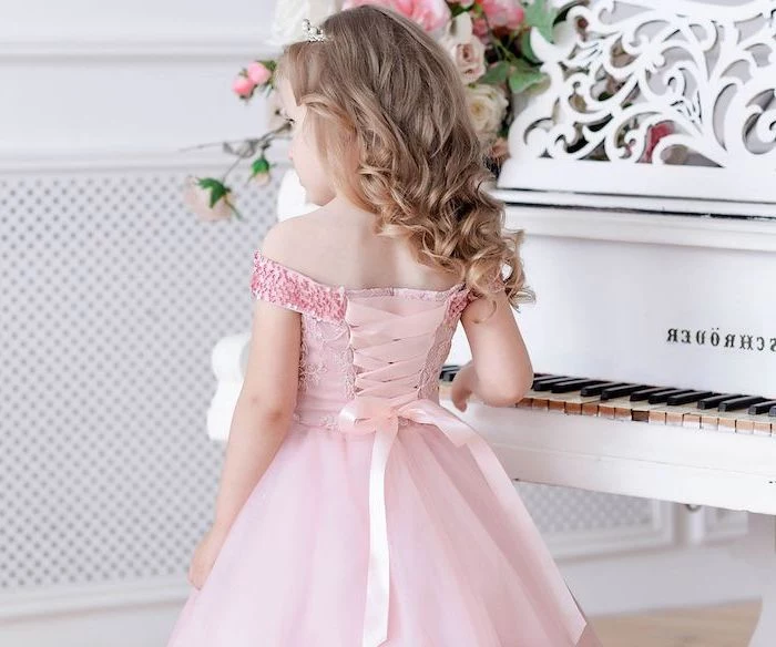 pink tulle dress, with sequins and ribbon, white piano, blonde wavy hair, lace flower girl dresses