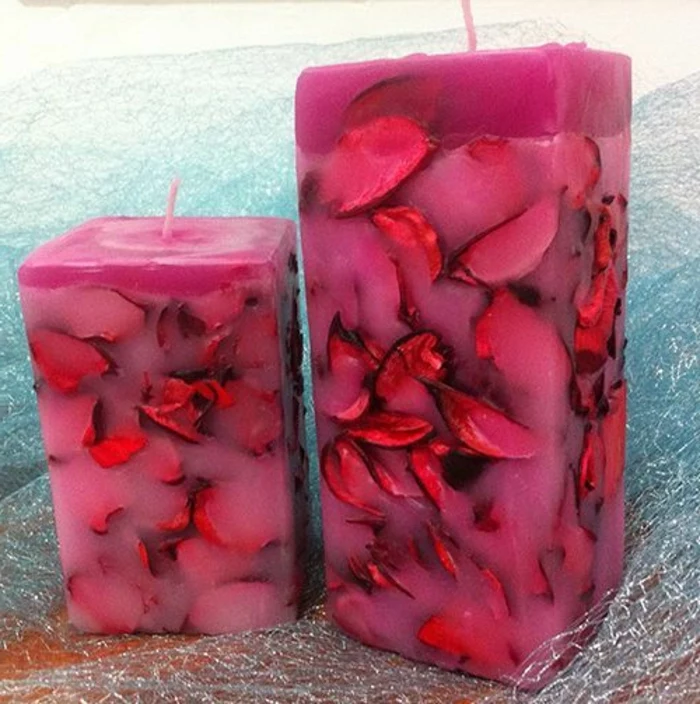 large square candles, rose petals inside, essential oil candles, pink candle wax