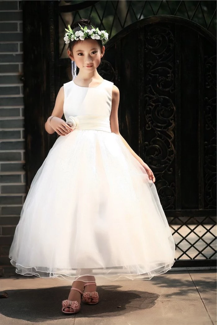 cute dresses for girls, white tulle dress, white flower crown black hair, in a bun, pink sandals