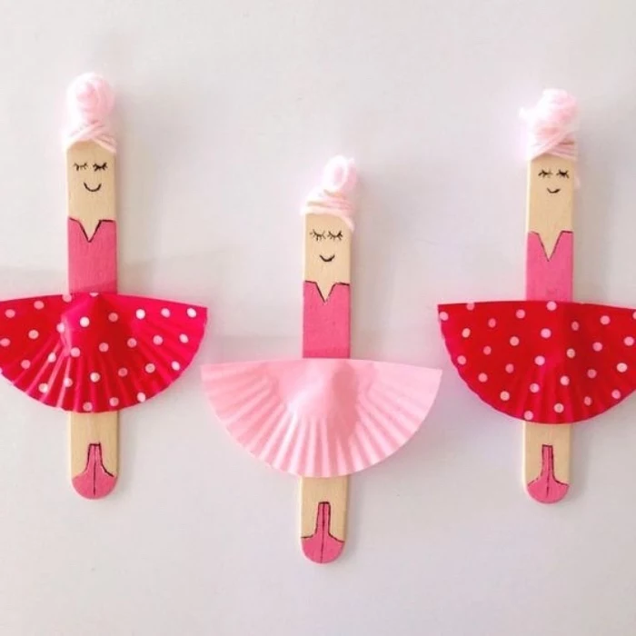 ballerinas made of popsicle sticks, fun indoor games for kids, pleated paper for skirts, pink strands for hair