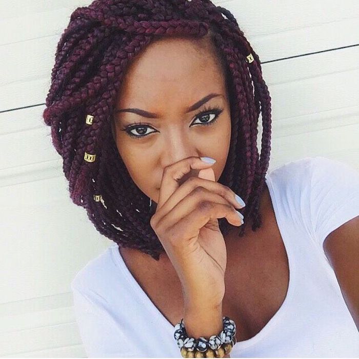 red burgundy short hair, with beads, braiding styles with weave, woman wearing a white t shirt