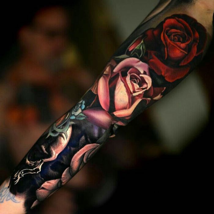 meaningful tattoos, pink and red roses, arm sleeve tattoo