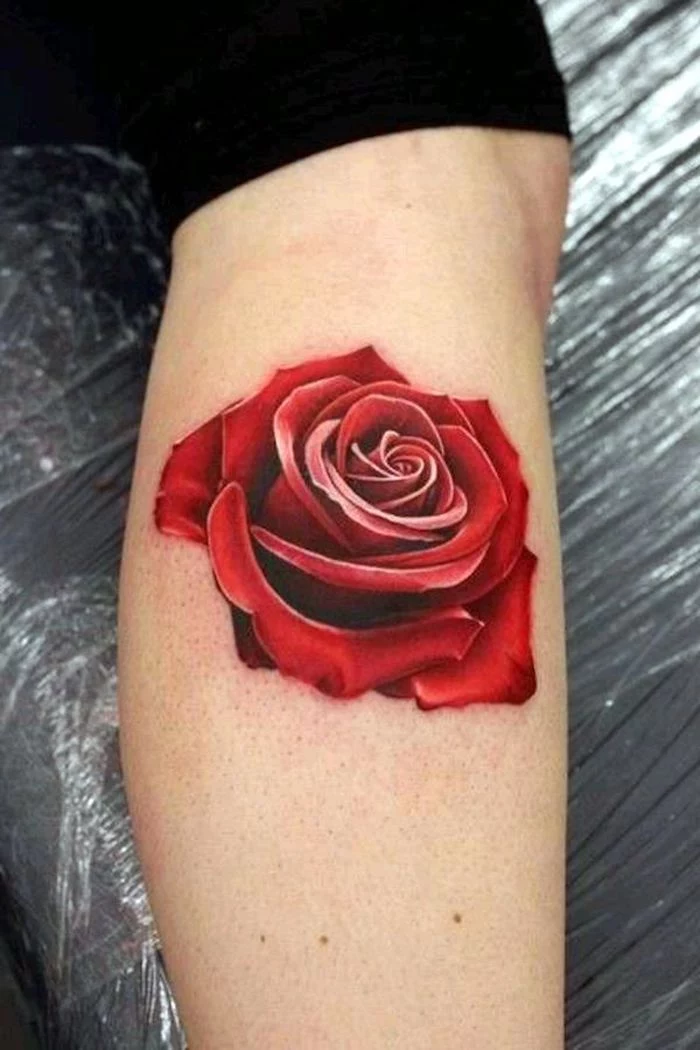 large red rose, side leg tattoo, black pants, small tattoos with meaning