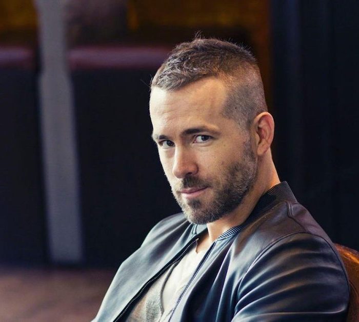 ryan reynolds, wearing a leather jacket, short brown hair, hairstyles for men