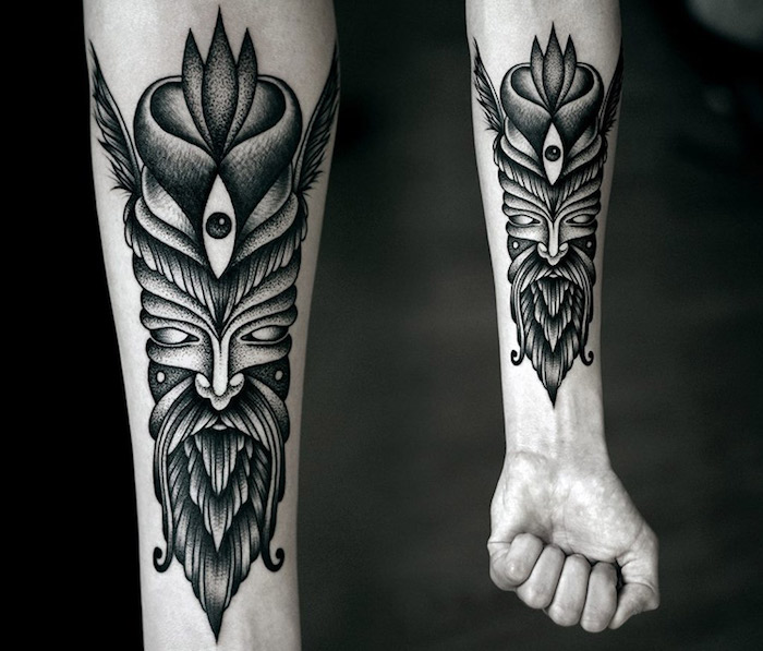 god of forest, forearm tattoo, side by side photos, black background, cool arm tattoos