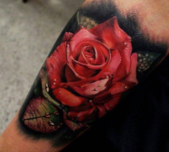 large red rose, covered in raindrops, forearm tattoo, tattoos for girls on hand