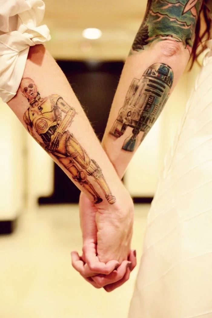 star wars inspired, his and hers matching tattoos, back of arm tattoos, large hallway