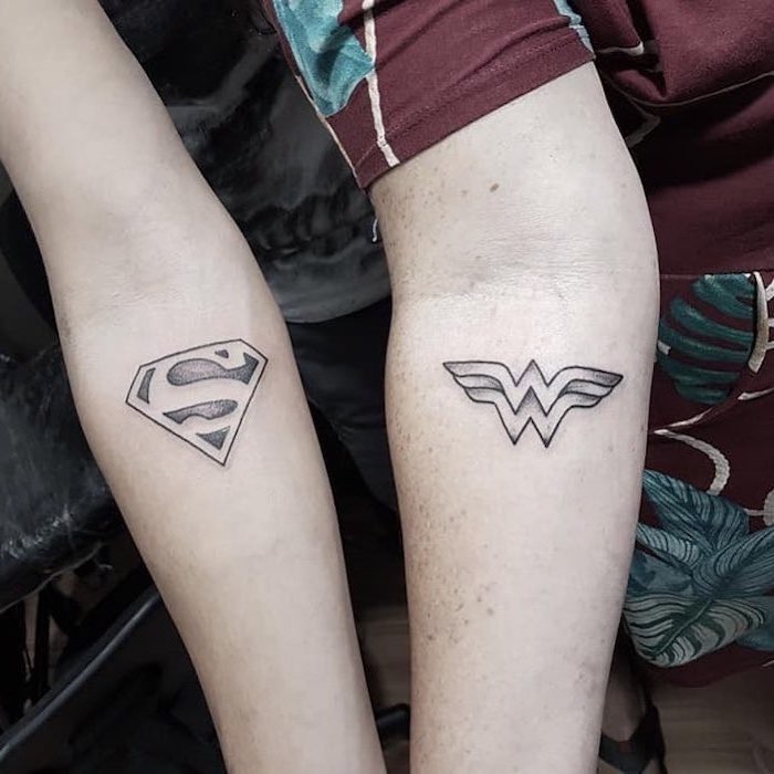 superman and wonder woman, couple tattoos small, forearm tattoos, dc inspired