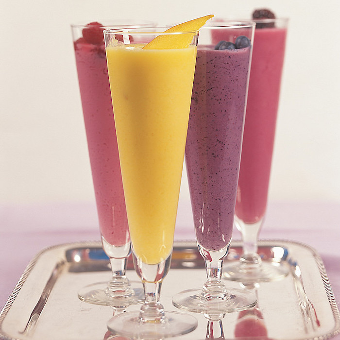 tall glasses, peanut butter banana smoothie, different smoothies, on a metal tray