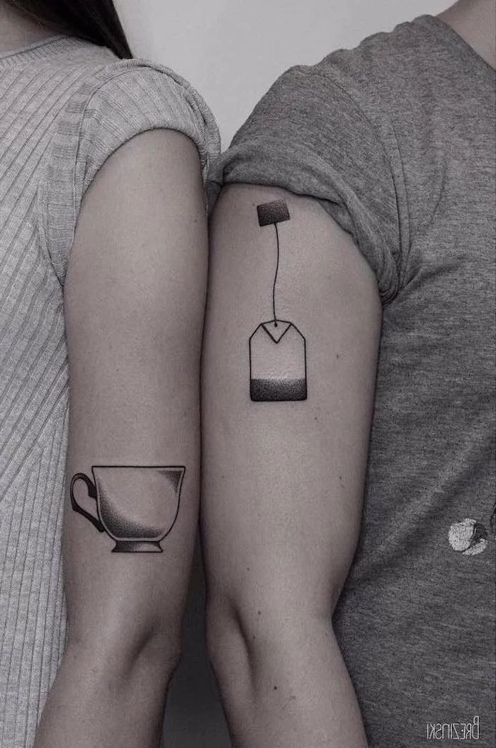 tea cup, tea bag, shoulder tattoos, couple tattoos small, grey sweater and shirt