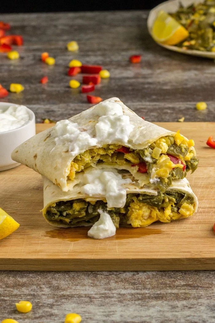 wrapped burrito, avocado and eggs inside, cream cheese, vegetarian super bowl recipes