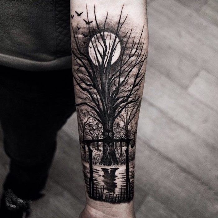 tree over a river, moon in the sky, small tattoos for guys, wooden floor