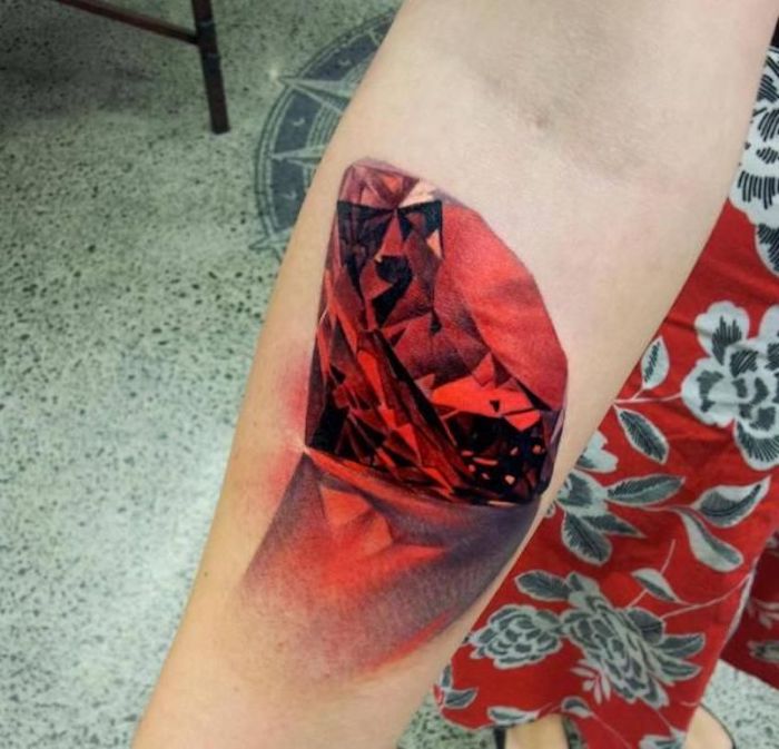 what tattoo should i get, large red diamond, forearm tattoo, red skirt