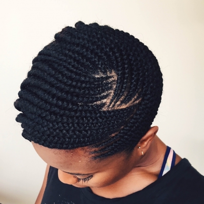 braids hairstyles pictures, of black hair, on a woman wearing a black top, in front of a white background
