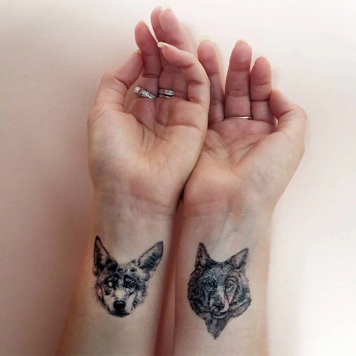 wolf heads, what tattoo should i get, wrist tattoos, silver rings