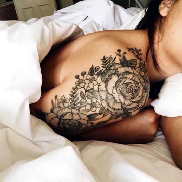 floral shoulder tattoo, white bed linen, what tattoo should i get