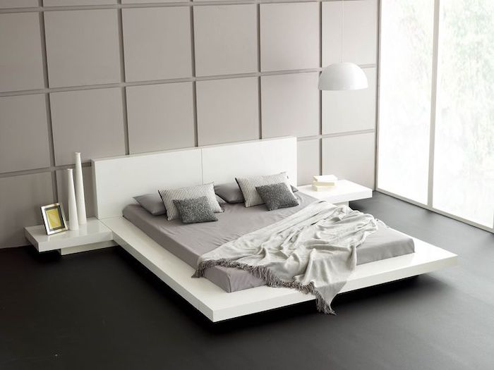 black wooden floor, white bed frame and shelves, grey tiled wall, tall windows, pinterest bedroom