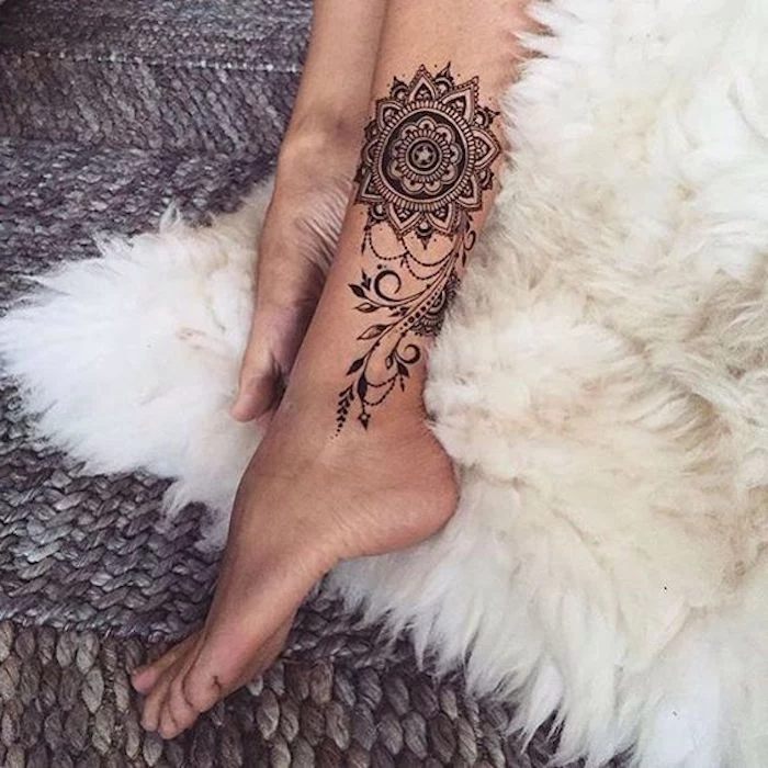 mandala leg tattoo, white furry blanket, female tattoos gallery, grey carpet