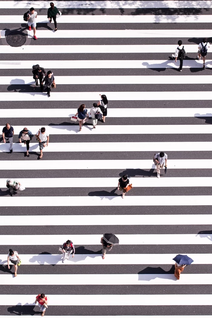 large crossing, people walking along, grey white stripes, tumblr backgrounds black and white