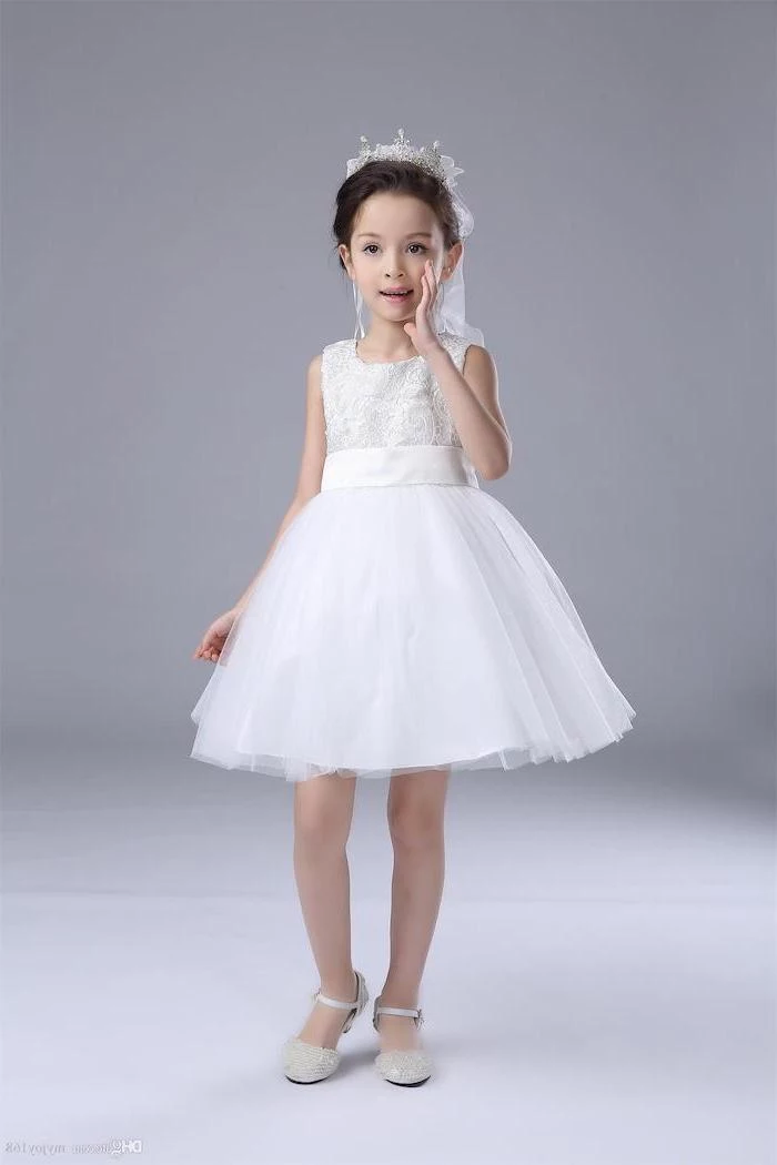 white lace and tulle dress, white background, girls dresses for special occasions, white shoes, black hair