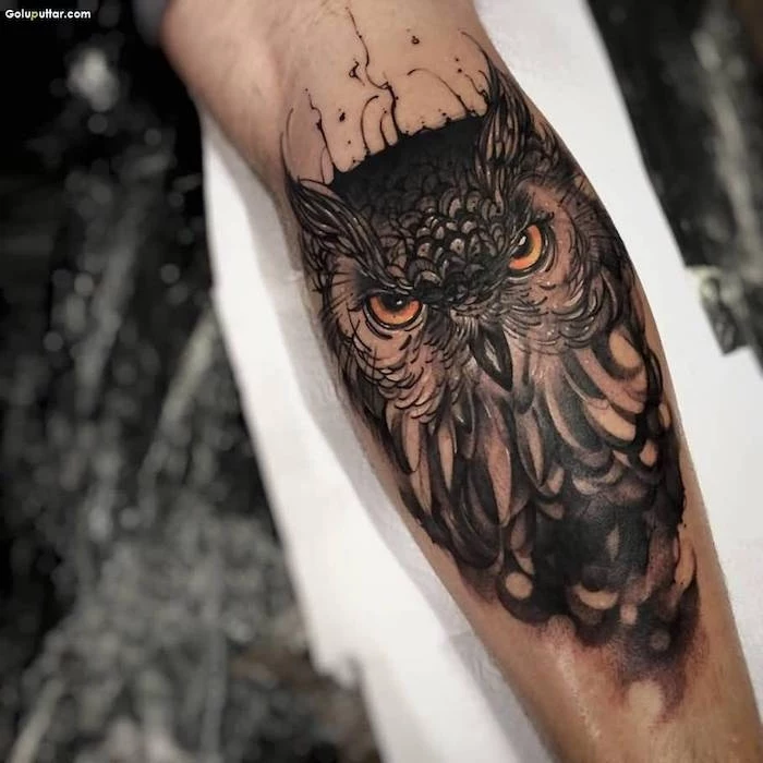 owl head, arm tattoos for men, white papers, blurred background