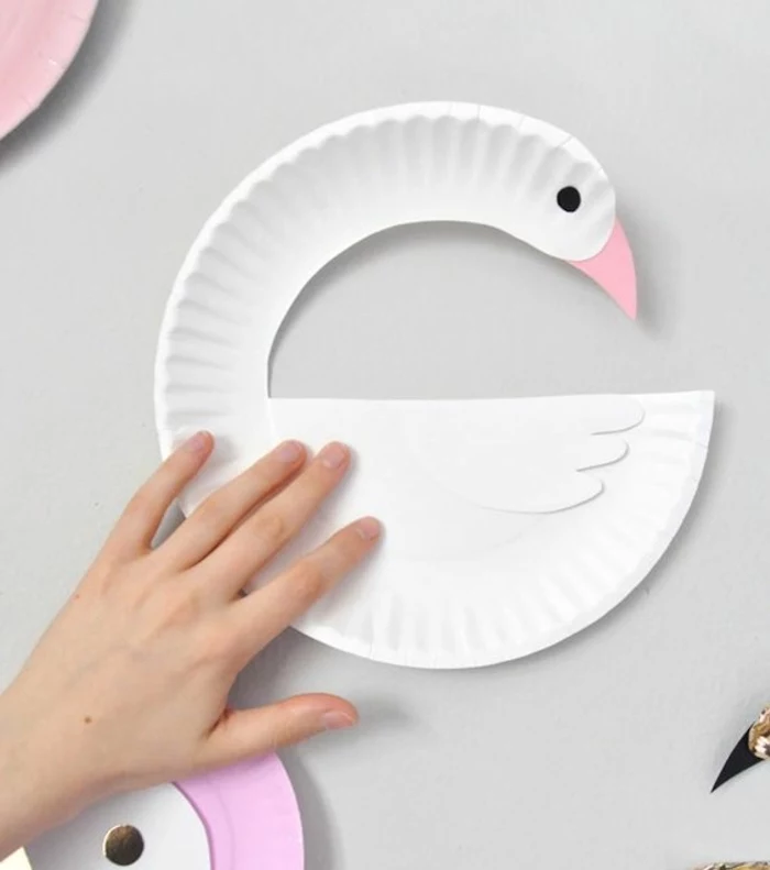 white swan, made of a paper plate, small group activities for preschoolers, white background