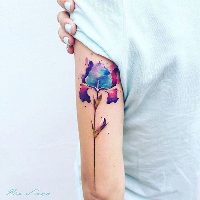 tattoos with deep meaning, watercolour flower, back of arm tattoo, white top