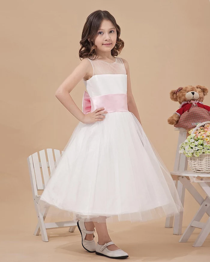 white tulle dress, pink bow, white shoes, girls dresses for special occasions, wooden chair and table