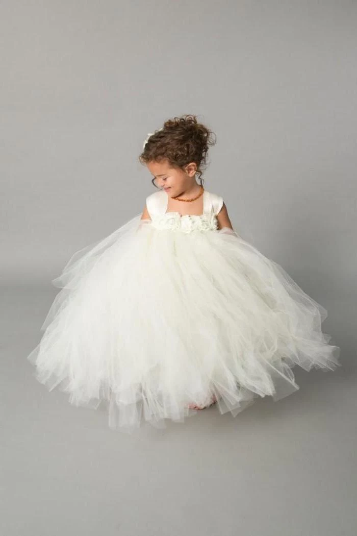 white tulle dress, brown curly hair, in a low updo, girls dresses for special occasions, white background