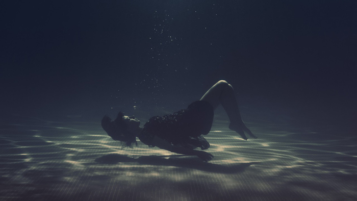 woman floating, tumblr backgrounds black and white, pool full of water