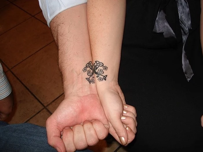 wrist tattoos, boyfriend and girlfriend matching tattoos, tiled floor
