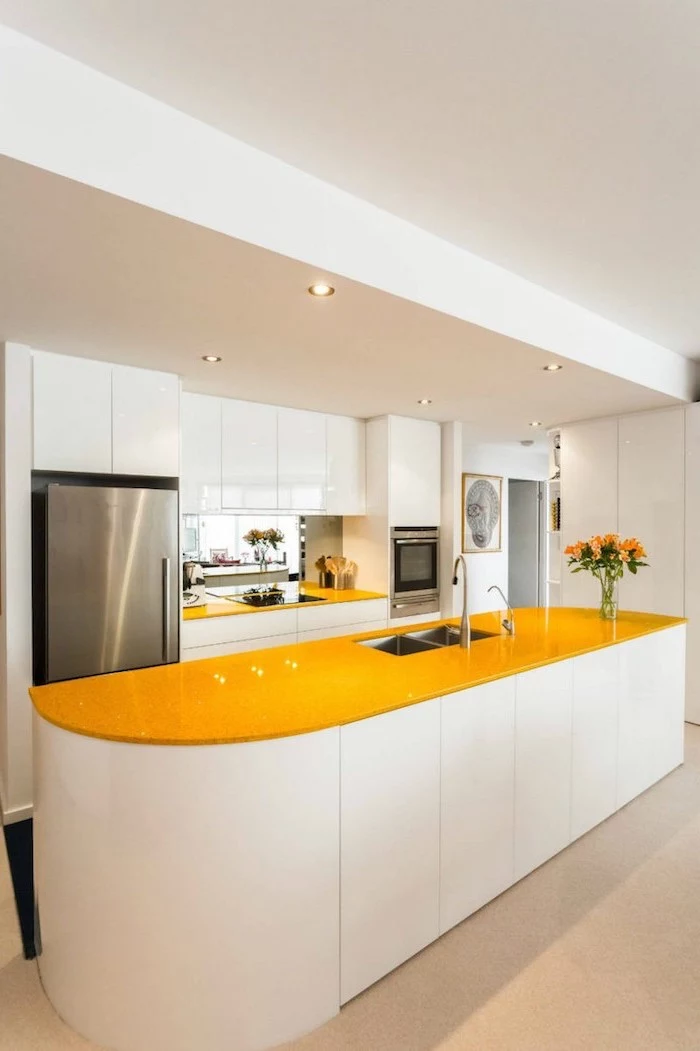 yellow countertops, white cabinets, pictures of kitchen islands, white tiled floor