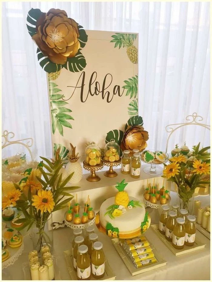 hawaii theme, 13th birthday party ideas, pineapple cake, large gold paper flowers, pineapple juice
