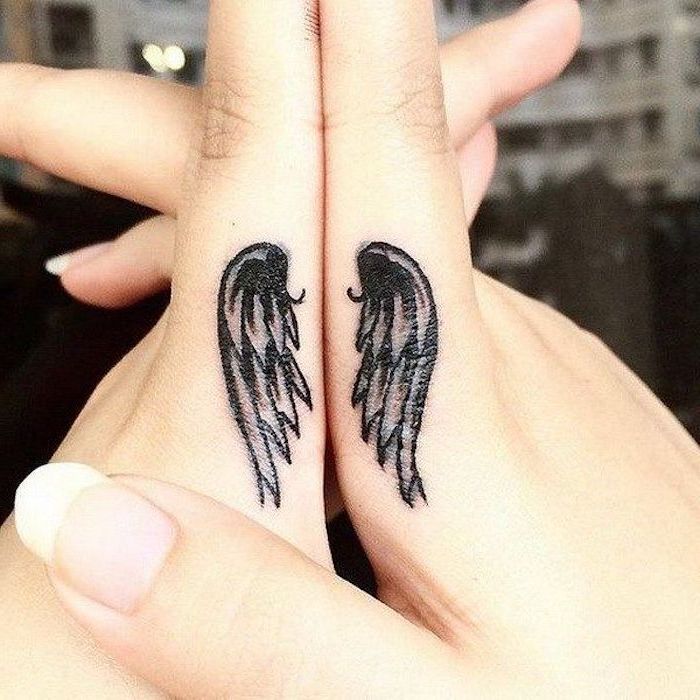 angel wings, finger tattoos, matching mother daughter tattoos, long nails