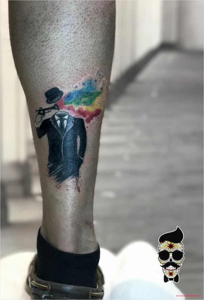 back of leg tattoo, watercolor tattoo, man's suit and hat, leather shoes