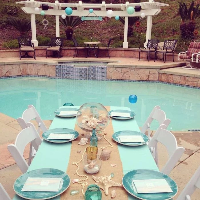 beach theme, by the pool, seashells and pearls on the table, blue and beige colours, 13th birthday party ideas