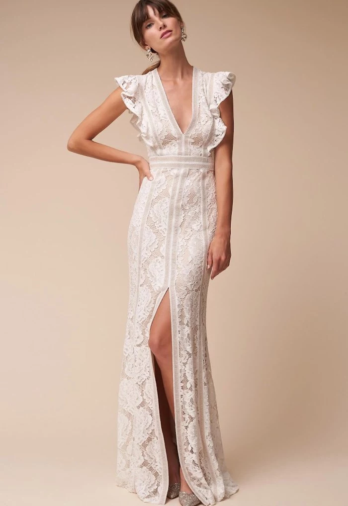 long lace dress, with a slit, wedding dresses for beach weddings, brown hair, in a ponytail, with bangs