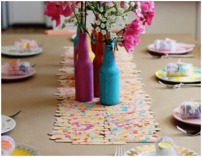 popsicle sticks, table runner, birthday themes, beer bottles, turned into vases, painted in pink and blue