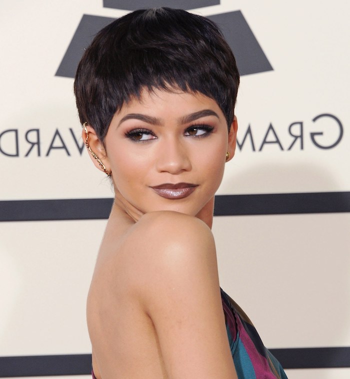 zendaya with short hair, short hairstyles for black women, gold earrings, colourful dress