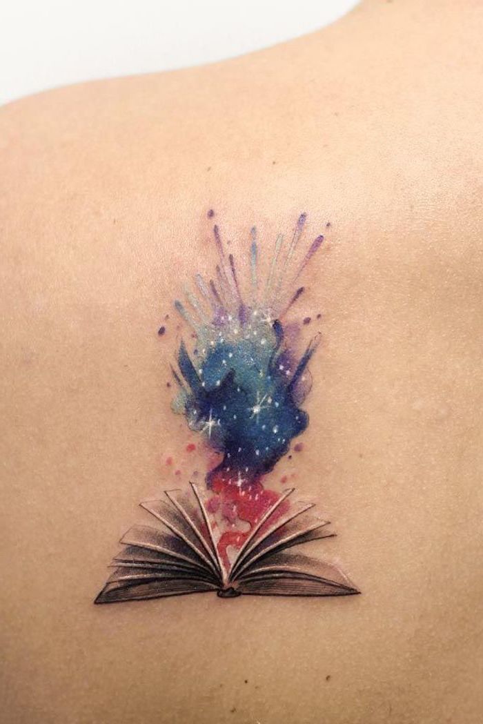 watercolor book, shoulder tattoo, white background, watercolor feather tattoo